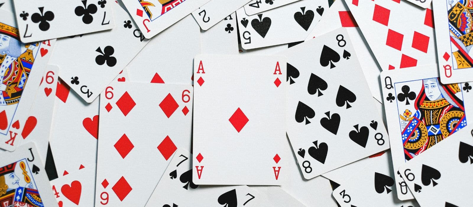 An in-text image displays a deck of cards.