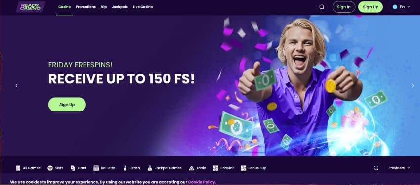 ReadyCasino homepage showing an animated man giving a thumbs up and smiling with details of the free spin bonus in the banner