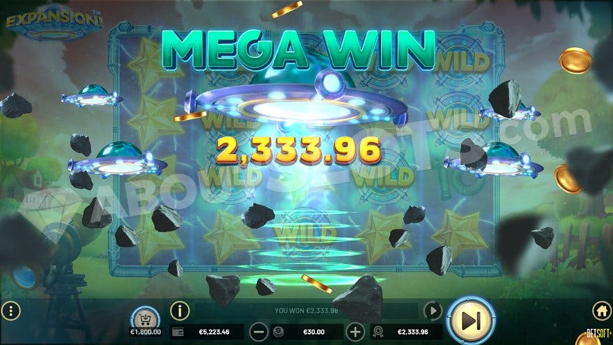 A soaring UFO with the text "Mega Win" above it.