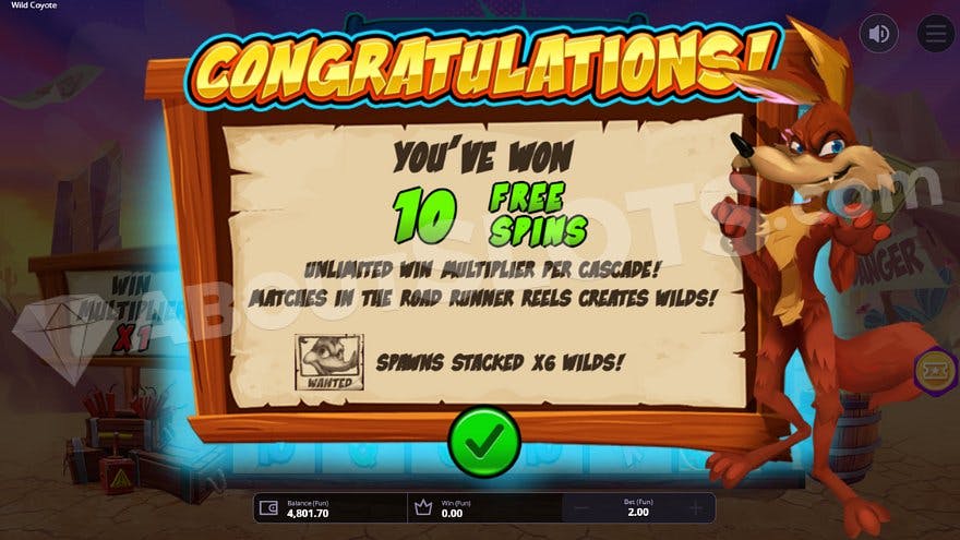 A wooden board saying "congratulations, you've won 10 free spins", with a coyote standing next to it.