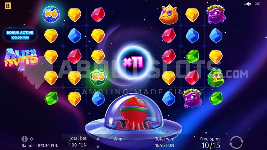 Free Spins bonus game with a red alien below the reels.