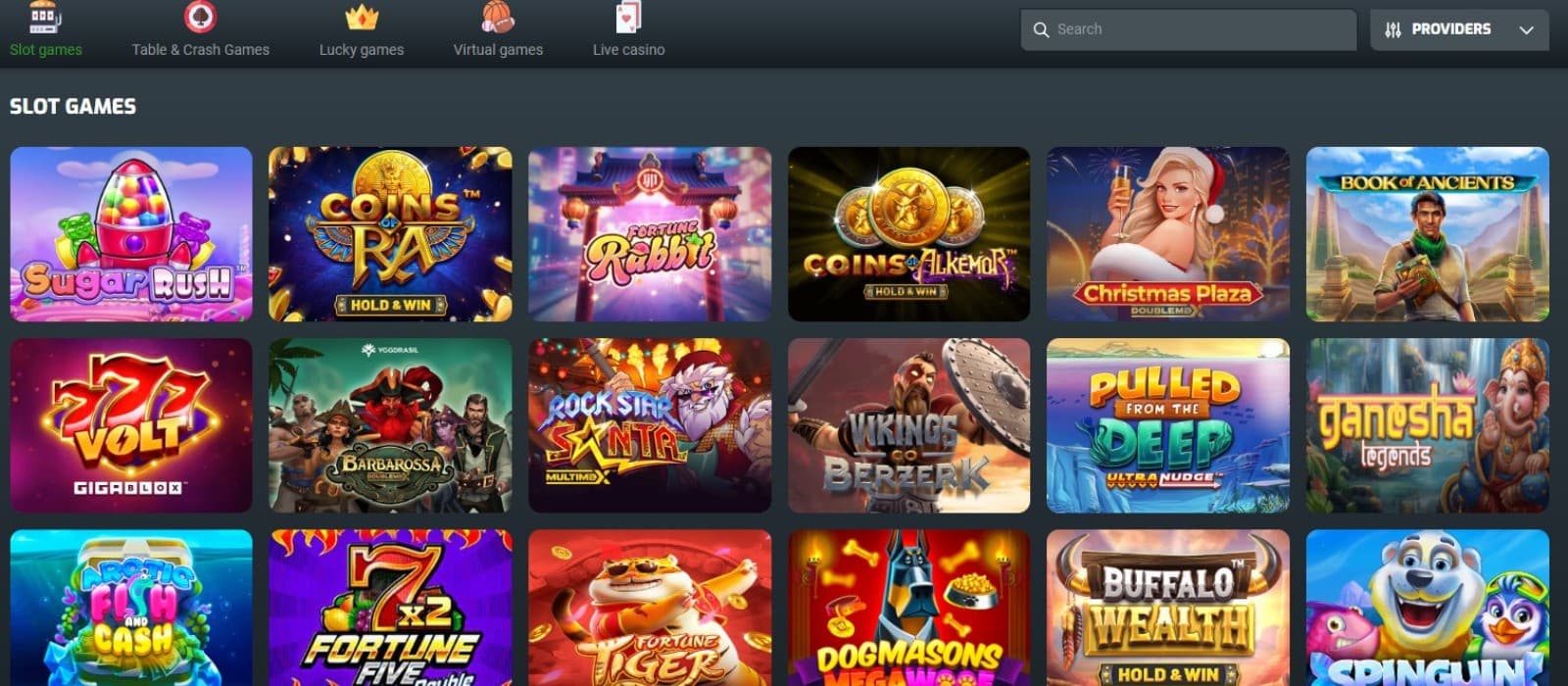 The games section of EvoBet casino displays a selection of slot games, such as Sugar Rush, Coins of RA and more.