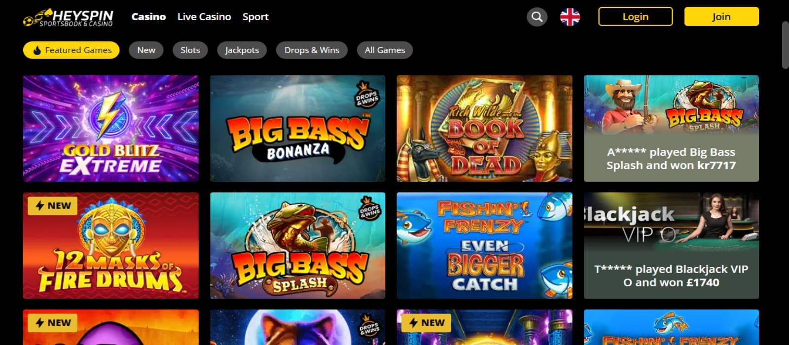 HeySpin casino games page with various colorful slot games icons and top navigational menu with black and yellow background theme