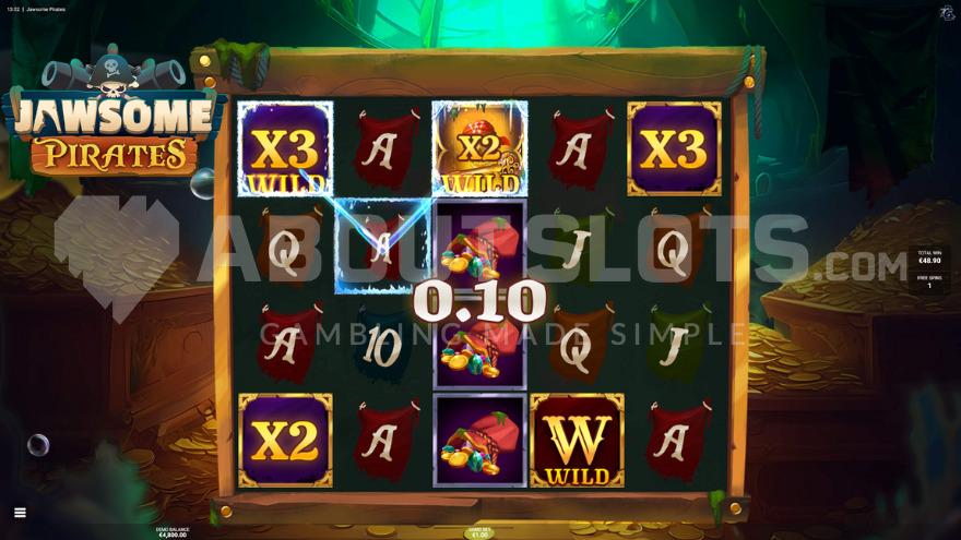 Jawsome Free Spins feature with chests filled with gold in the background.