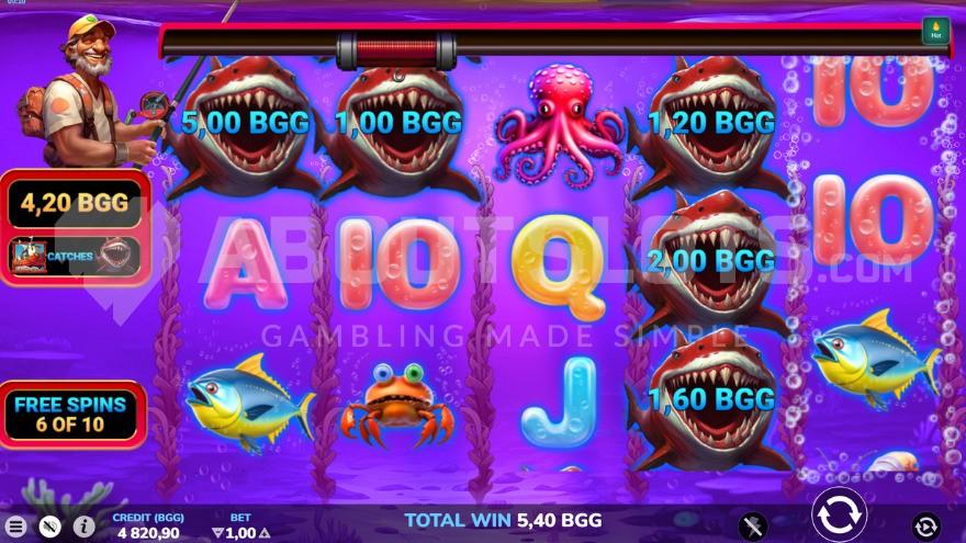 Free Spins bonus game with five shark symbols on the reels.