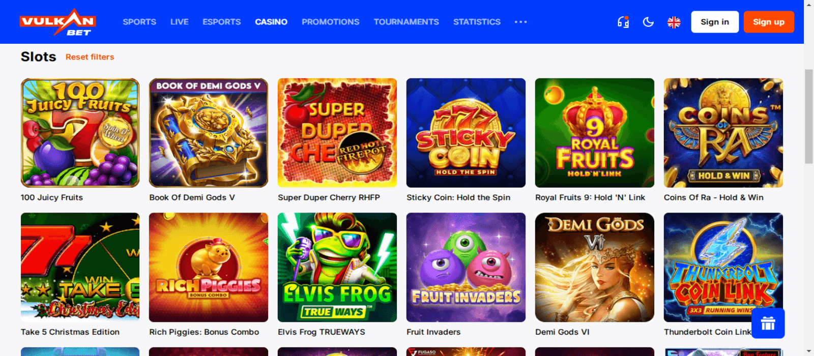 Vulkan.bet casino games page showing the colorful icons of various slot games and top navigational menus with the logo of the casino