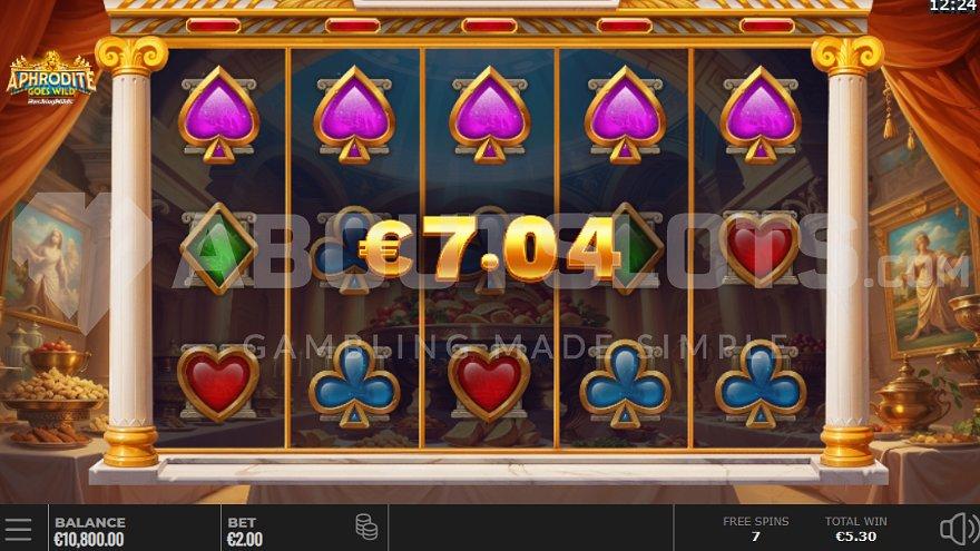 Five spades on the top row form a win in the Free Spins. 