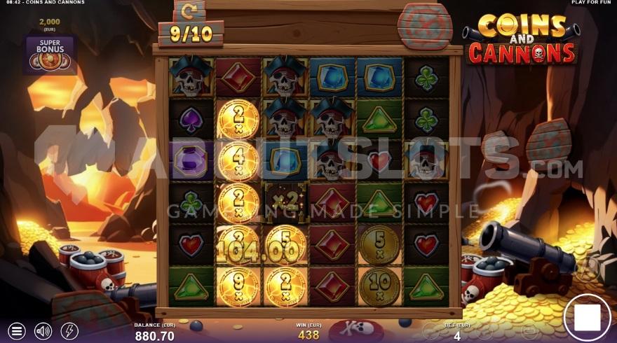 A screenshot of the Super Free Spins in a cave full of gold & cannons