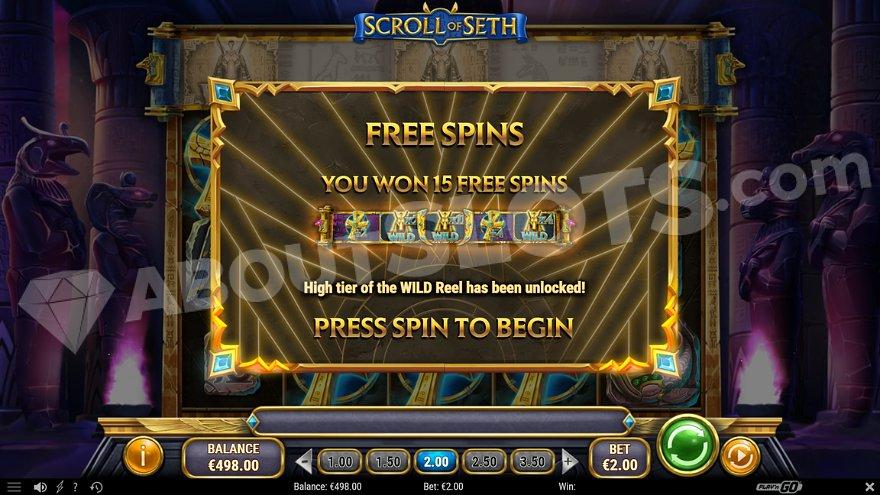 A screen congratulating a win of 15 free spins.