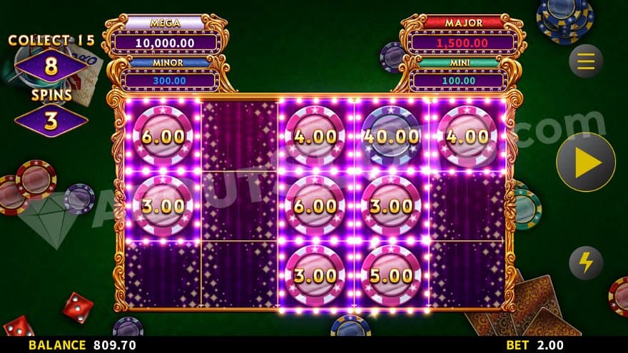 A green casino table with the purple colored reels on top, showing nine Link & Win symbols with different values.