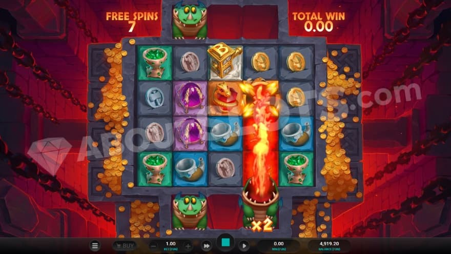 Fiery Free Spins feature being active with three Fang symbols on the reels.