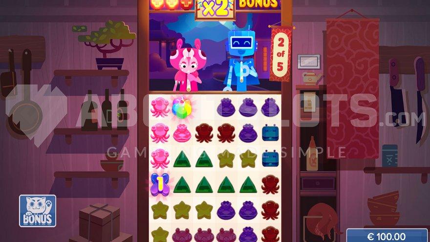 A pink and a blue collector slurping up symbols in the Free Spins.