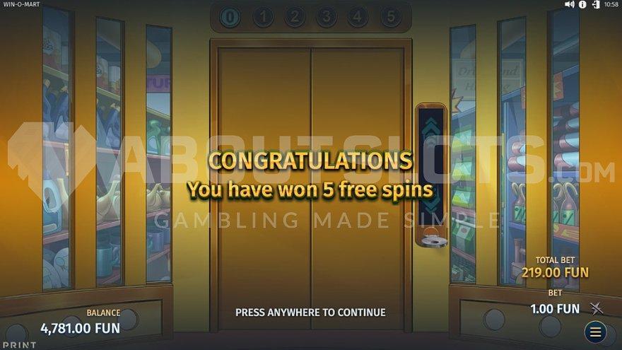 A screen congratulating to 5 free spins.